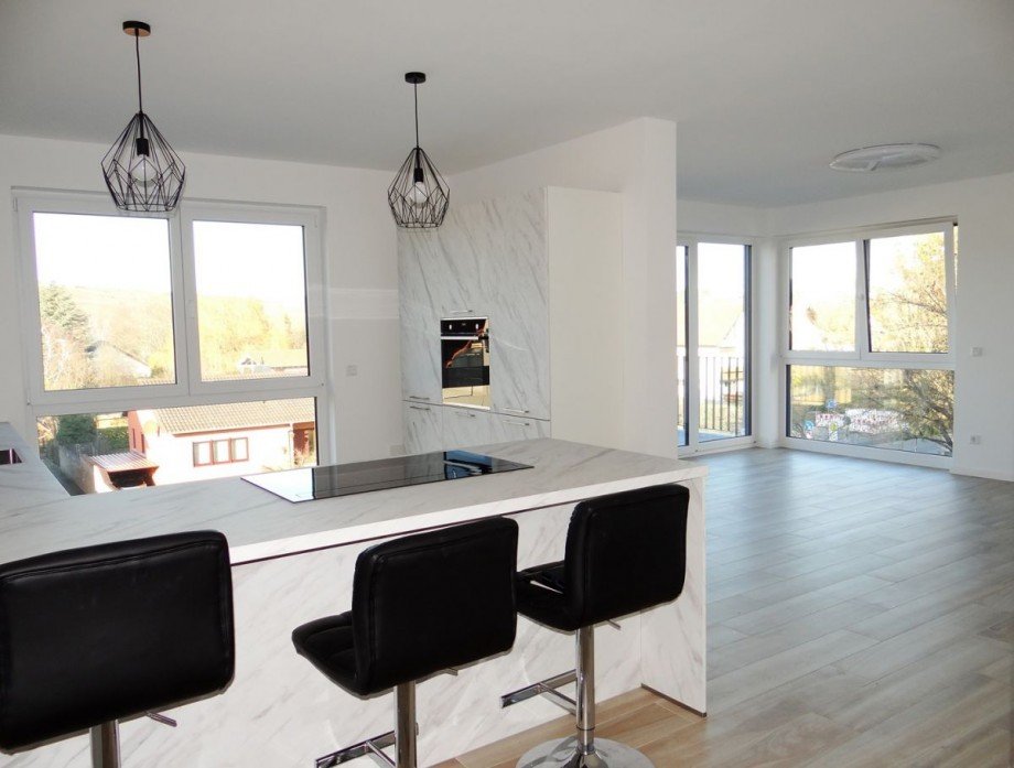 Wohnzimmer mit integr. EBK Wohnung Alzey