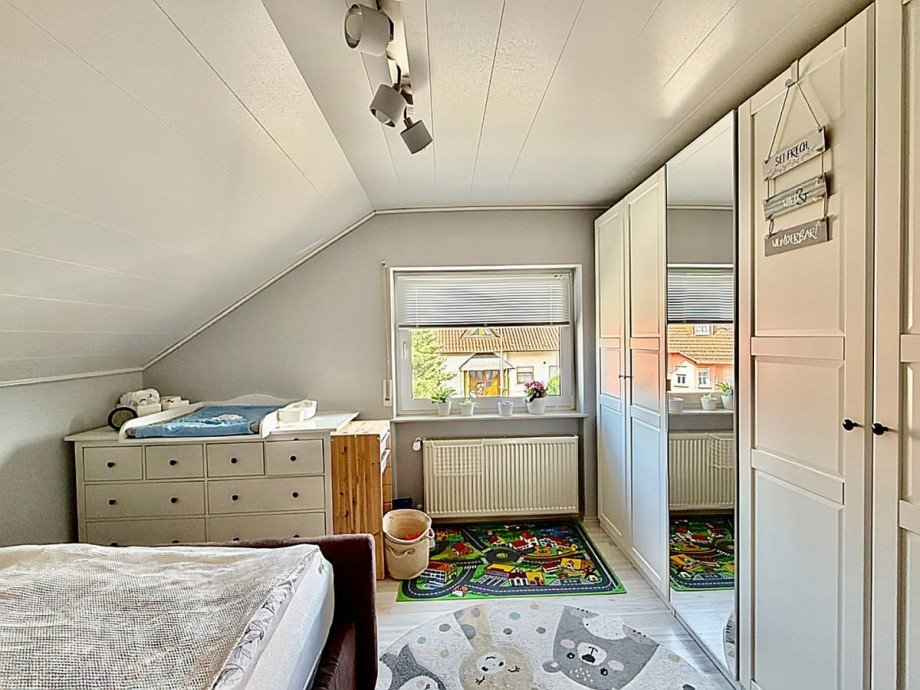 Schlafzimmer I Etagenwohnung Mauchenheim