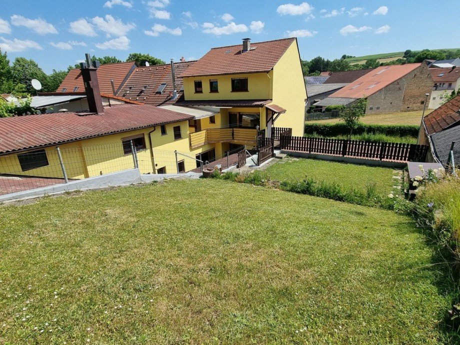 Hausansicht Gartenseite Einfamilienhaus Nieder-Wiesen